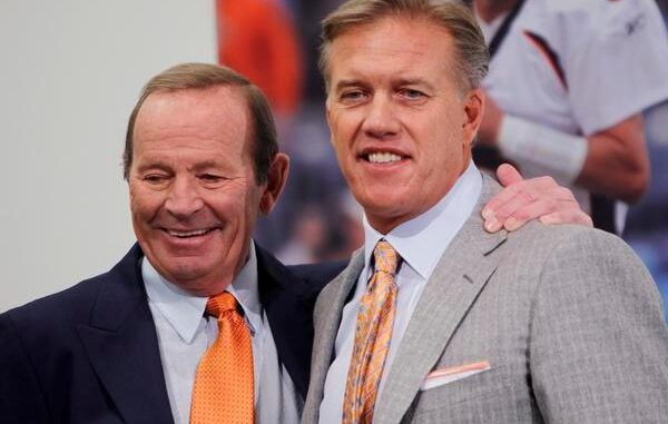 20110119__Broncos-Elway-Footballp1